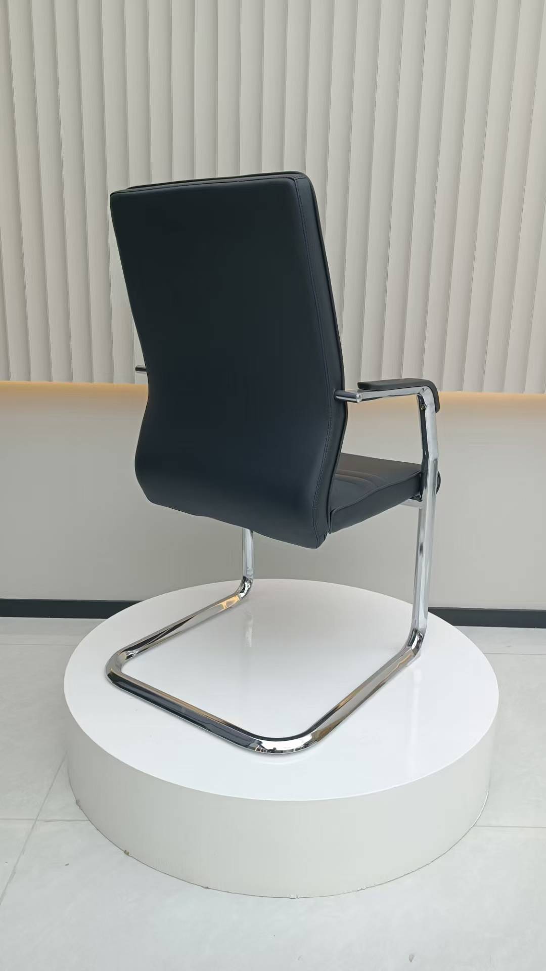 Modern minimalist style black leather office chair description