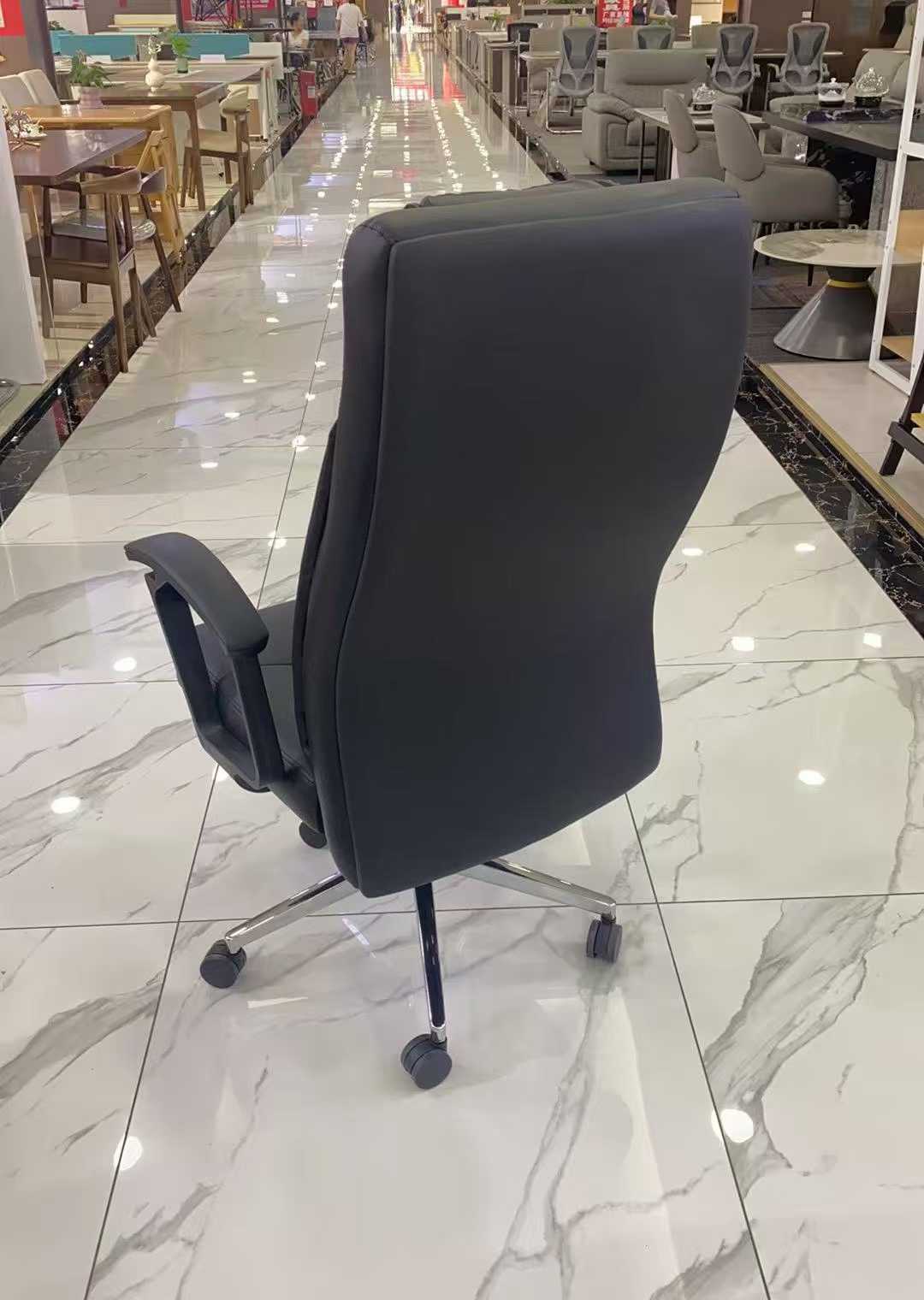 High end black office chair, comfortable and stylish office companion